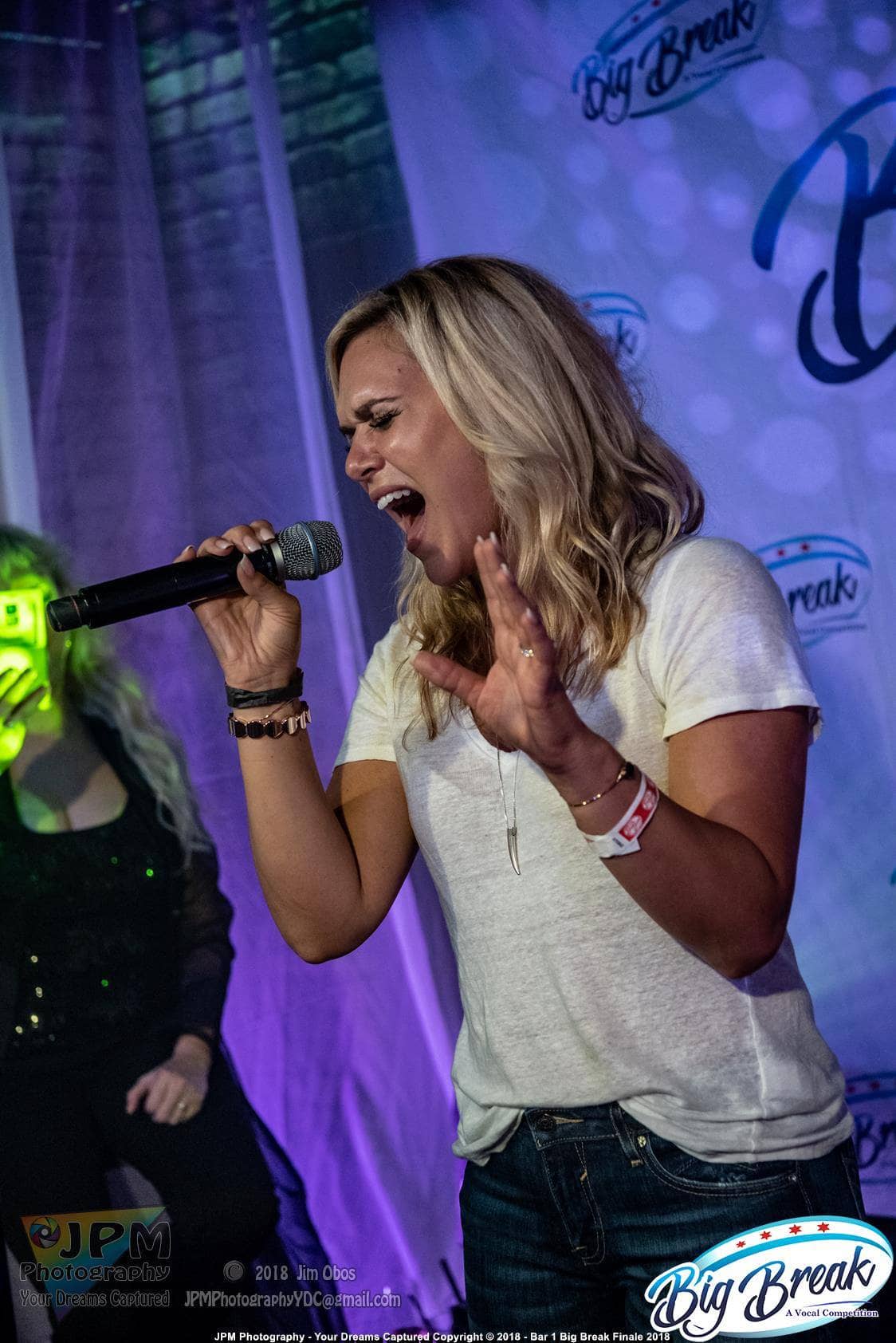 Raise Your Glass performing Shout live.